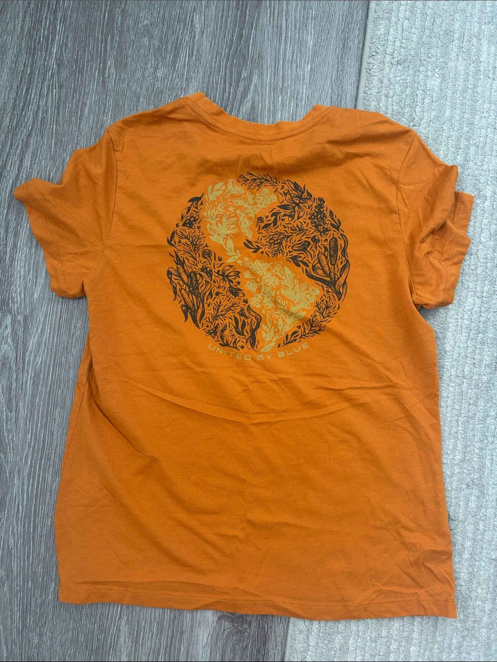 United by Blue Orange Graphic Tee with Subtle Chest Artwork